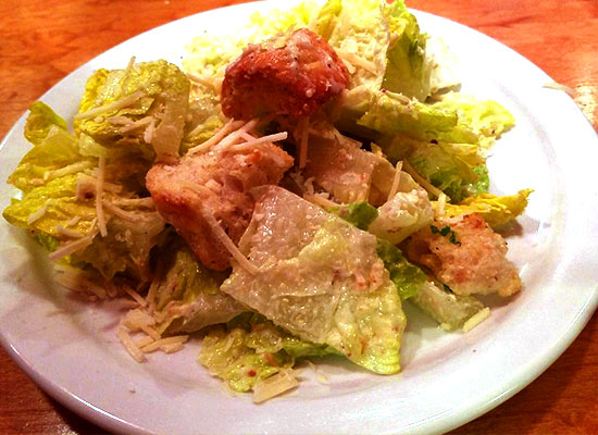 Caesar salad at The Grill at Fairview Inn Restaurant, Marshfield Massachusetts, with croutons & cheese.