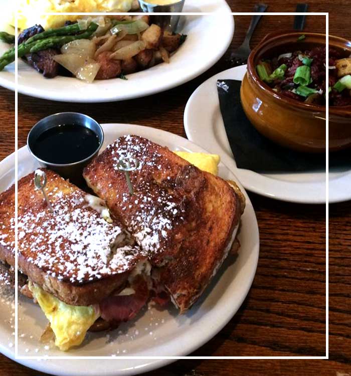 French toast sandwich, eggs & syrup with potatoes and salad at The Grill at Fairview Inn.